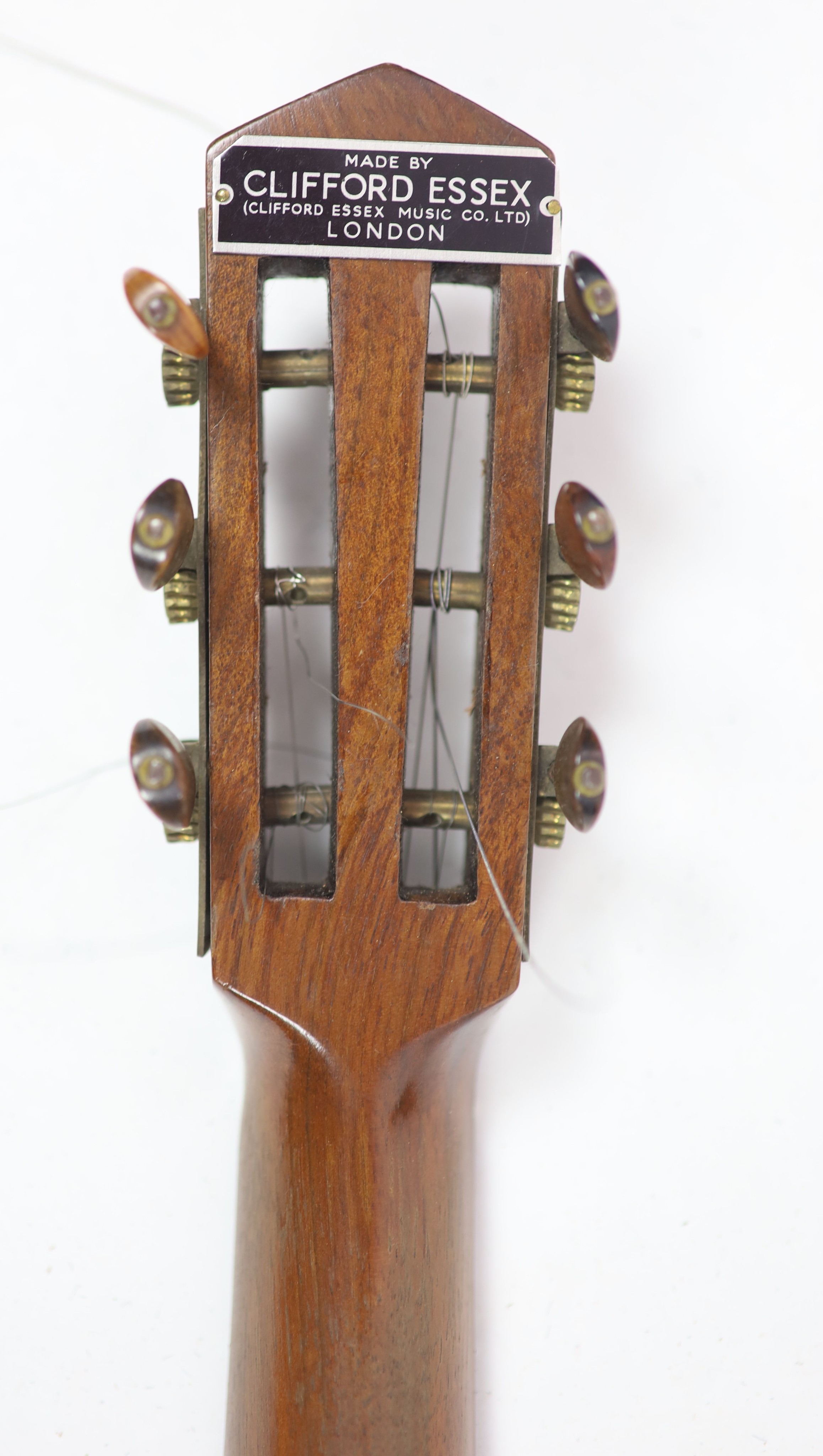 A Clifford Essex banjo overall 90cm, with distressed leather case